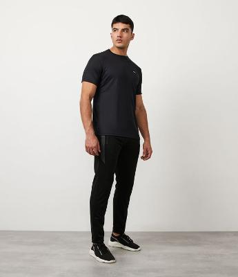 Calça Esportiva com Faixa Laterais e Zíper na Barra