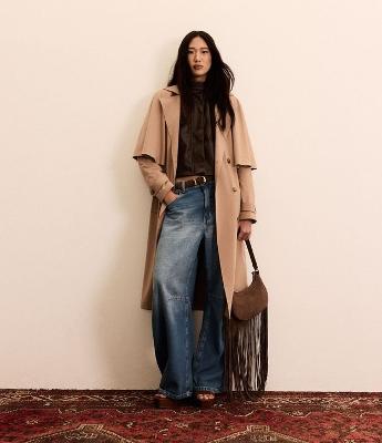 Calça Barrel em Jeans com Bolso Diferenciada