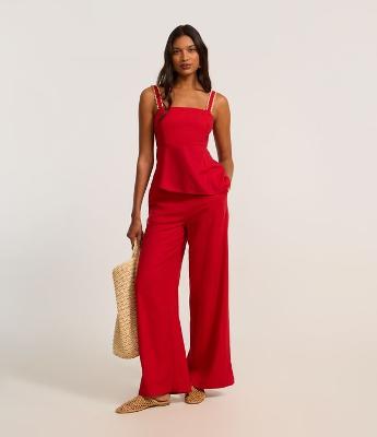 Calça Pantalona em Viscolinho com Bolinhas nos Bolsso
