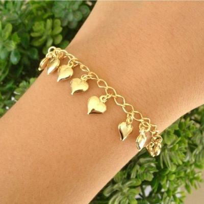 Pulseira Com Vários Pingentes De Coração Banhado A Ouro