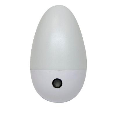 Luz Guia Noturno Oval Com Sensor Taschibra 0,5w Bivolt