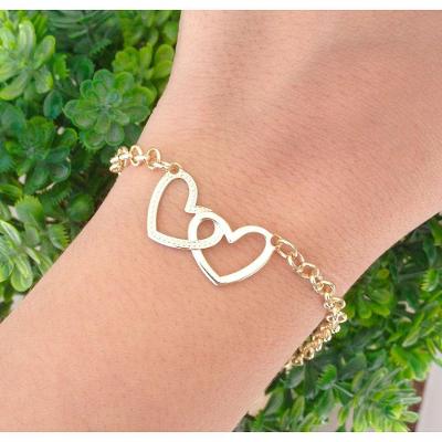 Pulseira Dois Corações Vazados Banhado A Ouro