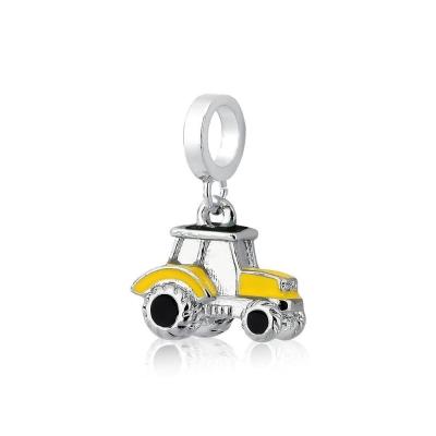 Charm Trator Esmaltado Com Revestimento Prateado Cor Amarelo