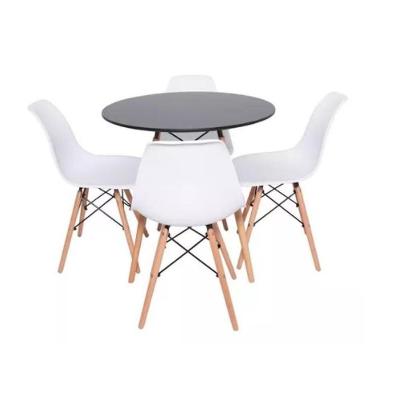 Conjunto De Mesa De Jantar Eames Eiffel Redonda 120cm Tampo De Madeira Preto Com 4 Cadeiras Brancas