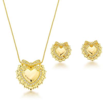 Conjunto Colar E Brincos Coração Com Laço Banhado A Ouro 18k