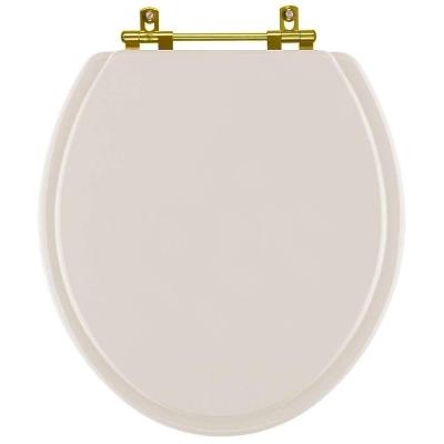 Assento Sanitario Poliéster Convencional Oval Amendoa Para Vaso Ideal Standard Com Ferragem Dourada