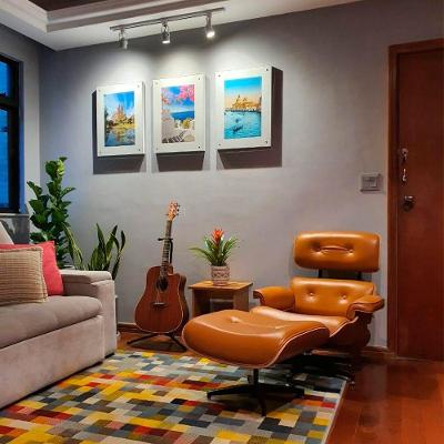 Poltrona Charles Eames Premium Com Puff Couro Caramelo Cor Amarelo
