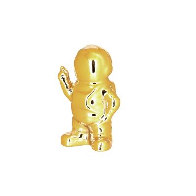 Figura Astrona Dedo em Riste Dourado 100Mm